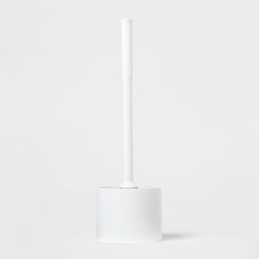 a white toothbrush holder on a white background