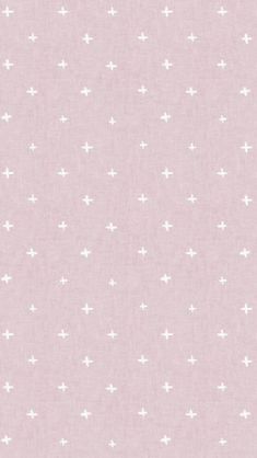 a pink and white wallpaper with small stars on it's side, in the middle