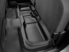 the interior of a car with two seats and one arm rest in place on the floor