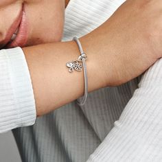 Family comes first, second and third in this triple dangle charm. Crafted in sterling silver, the Family Infinity Triple Dangle Charm features a family tree inside an openwork heart and an infinity sign decorated with sparkling pavé; three powerful symbols of closeness and everlasting love in one piece of jewellery. Wear this dangle charm to keep your loved ones close wherever you go. | Pandora Family Infinity Triple Dangle Charm in Sterling silver Awesome Mix Vol 1, Pandora Family, Marvel Guardians Of The Galaxy, Charms Pandora, Peter Quill, Charm Holder, Custom Charms, Star Lord, Dog Bone