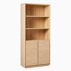 an empty wooden bookcase with two doors