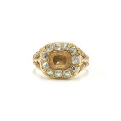 A foil-backed cushion citrine is set in a surround of old mine diamonds totaling approximately 1.10 carats in a 15 karat yellow gold mounting with closed back settings and decoratively engraved shank. Circa 1800. 3 Square Diamond Engagement Rings, Chunky Engagement Rings, Georgian Engagement Ring, Eclectic Engagement Rings, Signet Engagement Rings, Square Diamond Engagement Ring, Georgian Ring, Edwardian Ring, Ring Inspo