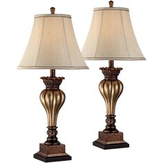 a pair of lamps sitting next to each other