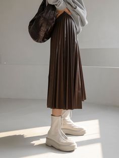 Vegan leather pleated skirt. Flared A Line. Model is in MINUSEY ONE SIZE. ✔️ Free worldwide express shipping over $100✔️ Loved by 6,500+ customers✔️ Limited edition collections, maximum style⠀⠀⠀⠀⠀⠀⠀⠀⠀Stay ahead of the trend with can’t-find-anywhere-else staples. Your closet will thank you 💕 * MINUSEY ONE SIZE = EU 34-38, US 2-6* 100% PU Leather* Dry clean* Made in Korea - Model Height: 172cm/5'7" (US2, EU34) Pleated Flare Skirt, Leather Pleated Skirt, The Trend, Flare Skirt, Pleated Skirt, Vegan Leather, Pu Leather, A Line, Normcore