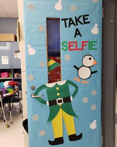 a classroom door decorated with an elf and penguin