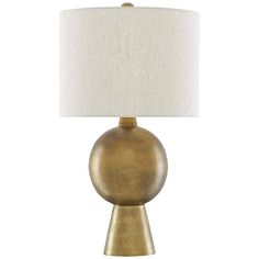 a gold table lamp with a white shade on the base and a beige linen lampshade