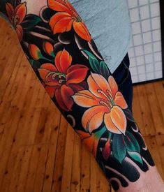 a person with a flower tattoo on their arm