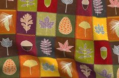 an image of a quilt with leaves on it