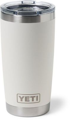 the yeti stainless steel tumbler is white and has a silver lid with a gray trim