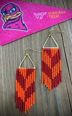 Virginia Tech Hokie Chevron Dangle Seed Bead Fringe Earrings. Hand Beaded Chevron Dangle Seed Bead Fringe Earrings with gold plated ear wires and triangle loop. Maroon and Orange glass seed beads. Show your Hokie spirit with these fabulous earrings! Super lightweight. Seed Bead Fringe Earrings, Bead Fringe Earrings, Orange Jewelry, Bead Fringe, Virginia Tech, Beaded Fringe, Glass Seed Beads, Bead Patterns, Fringe Earrings