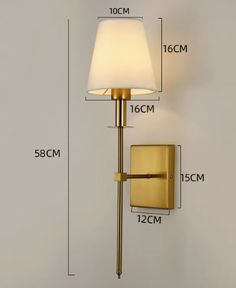 an image of a wall light with measurements for the size and width in front of it