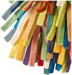 a bunch of multicolored towels hanging from a hook