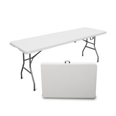 a white table sitting next to a white box