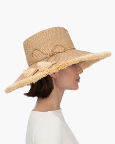 If you are looking for a woman's sun hat for sale online that is sure to turn heads, look no further! Named from the Caribbean Island that has endless beaches and warm turquoise water, this sun hat made of Squishee®, is a show stopper. This flirty, tropical sun hat combines the pinched crown of a fedora with a wide brim, edged all around with glamorous straw fringe. Wherever you adventure, from St. Barths to Antibes, approving smiles are sure to follow! Squishee® straw is a sustainable man-made Lightweight Straw Hat For Poolside, Lightweight Short Brim Hat For The Pool, Lightweight Short Brim Hat For Pool, Lightweight Short Brim Pool Hat, Coastal Style Straw Hat With Upf 50+ For Poolside, Coastal Straw Hat With Upf 50+ For Poolside, Beachy Panama Hat With Upf 50+, Coastal Hat With Upf 50+ For Poolside, Coastal Hats With Upf 50+ For Poolside