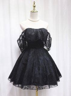 Aquiver with charm and sophistication, this homecoming dress is designed to make you feel like a star. The rich black lace fabric offers a timeless and elegant look, perfect for formal events. The off-the-shoulder neckline features a romantic ruffled overlay, adding a touch of femininity and grace. The fitted bodice accentuates your waist, while the full, A-line skirt flows gracefully, providing both volume and movement. The delicate lace sleeves add an extra layer of elegance, ensuring you look stunning from every angle. Made from luxurious materials, this dress promises comfort and ease as you enjoy your special night. Ideal for those who want to blend classic elegance with contemporary style, this homecoming dress is a standout choice. With its intricate design and attention to detail, Mini Homecoming Dress, Black Lace Fabric, Mini Homecoming Dresses, Bridal Hair Jewelry, Lace Strapless, Homecoming Dresses Black, Lace Dress Black, Style Noir, Dress Silhouette