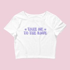 Introducing our "Take Me to the Rave" Y2K Rave Baby Tee – a stylish and comfy addition to your wardrobe, perfect for all the electronic music enthusiasts and festival-goers. This crop top is designed to capture the essence of the Y2K rave culture and the excitement of electronic music festivals. Embrace the rave vibes with this trendy baby tee. The "Take Me to the Rave" design signifies your passion for electronic music and the electrifying atmosphere of music festivals, making it an ideal choic Hip Hop Style T-shirt For Summer Music Festival, Summer Band Merch Top With Graphic Design, Summer Band Merch Tops With Graphic Design, Band Merch Tops With Graphic Design For Summer, Summer Concert Tops With Logo Print, Summer Band Merch Cropped T-shirt With Graphic Print, Y2k Cotton T-shirt For Music Festivals, Y2k Graphic Print Tops For Music Festival, Y2k Style Cotton T-shirt For Music Festival