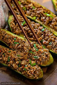 the stuffed zucchini is ready to be eaten with chopsticks