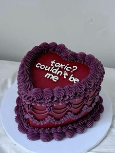 a heart shaped cake with words on it