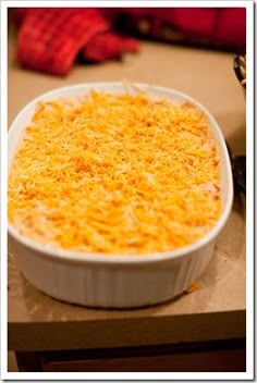 a casserole dish with cheese on top