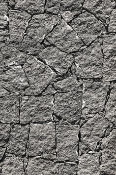 an image of a rock wall that looks like it is cracked