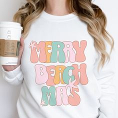 A Merry Beachmas sweatshirt makes a great beach Christmas sweater. Perfect if you're looking for a Florida or Hawaii Christmas shirt or for any other coastal Christmas locations.This crewneck beach christmas will definitely keep you cozy as well. Made of high-quality materials, this t-shirt is comfortable to wear and will last you season after season. Don't miss out on this must-have. Order yours today! Christmas Florida, Hawaii Christmas, Florida Christmas, Beach Lover Gifts, Tropical Christmas, Christmas Crewneck, Beach Christmas, Coastal Christmas, Beach Lovers