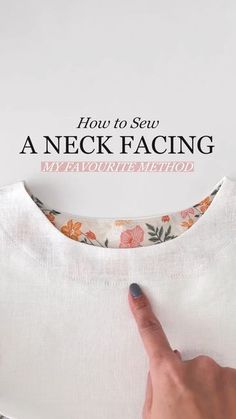 a person pointing at the back of a white shirt with flowers on it and text overlaying how to sew a neck facing