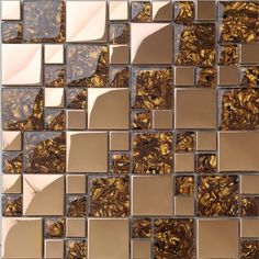 a mosaic tile wall with gold and brown squares on it's sides, as well as an abstract design