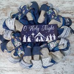 This O Holy Night wreath will make a wonderful addition to your indoor or outdoor home decor or a thoughtful gift for that special person or a special occasion. Use it for your own Christmas decor or as a housewarming gift. YOUR O HOLY NIGHT WREATH: Ready to Ship piece - see Processing below Approximately 24 inches round Made with premium blue and white mesh. Attached centerpiece (that is removable) Church Christian, Jesus Christmas, Outdoor Home Decor, Winter Ideas, Christmas Jesus, O Holy Night, Outdoor Home, Wreath Bow, Holy Night