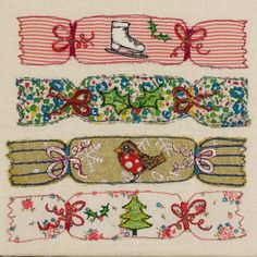 four ribbons with different designs on them, one has a boot and the other has a christmas tree