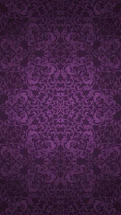 an ornate purple background with swirls and leaves