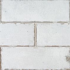 a white brick wall with no mortars or mortars on the bottom and one side