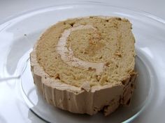 a piece of cake sitting on top of a glass plate