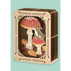 a wooden box with an image of a mushroom on it