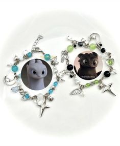 two necklaces with pictures of different animals on them and charms hanging from the sides