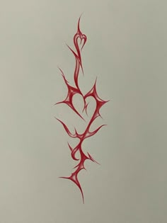 a red tattoo design on a white paper with the word love written in black ink