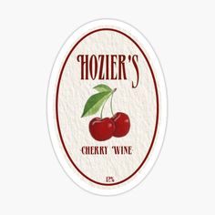 a sticker that says hozier's cherry wine with two cherries on it