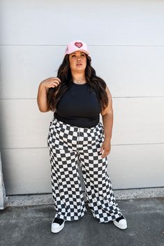 Ace Of Spades Checkered Pants These pants fit true to size Elastic waistband Extra cozy sweatshirt material Wide leg silhouette 1X: 14-16, 2X: 18-20, 3X: 20-22 Level up your style with our Ace Of Spades Checkered Pants! These plus size pants are the perfect addition to your closet for an edgy, yet casual look. Show off your unique style with these one-of-a-kind checkered pants! Eccentric Outfits Plus Size, Spanish Outfits, Checkered Pants, Maxi Jumpsuit, 2024 Style, Ace Of Spades, Pants Fit, Alt Fashion, Plus Size Pants