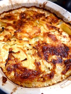 a pizza sitting on top of a pan covered in cheese