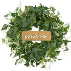 a wreath with the word welcome written on it