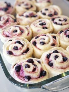 blueberry cinnamon rolls in a glass baking dish