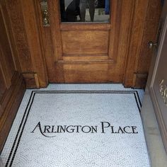 a door mat with the words arlington place on it