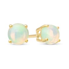 Fashioned in 10K gold, these stud earrings each feature a 5.0mm opal solitaire and secure comfortably with friction backs. Solitaire Studs, Lab Created Diamonds, Earring Backs, 10k Gold, Designer Earrings, Blue Topaz, Fashion Earrings, Gold Metal, Topaz