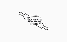 the bakery shop logo is drawn in black and white, with an image of a rolling pin