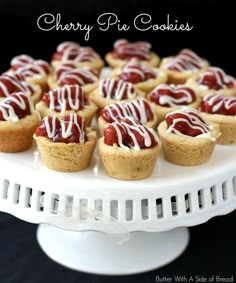 cherry pie cookies on a white cake stand