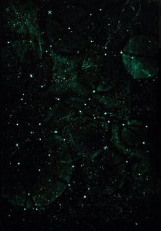 a black background with green stars on it