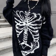 Step out of your comfort zone in this daring Grunge Skeletal Sweater. With a grungy ribcage design, it's the perfect way to showcase your edgy, moody style. Show them you're not afraid to take risks—it's a graveyard out there! Size Chart: Size Bust (cm) Shoulder (cm) Sleeve (cm) Length (cm) Bust (in) Shoulder (in) Sleeve (in) Length (in) S 102 54 45 60 40.16 21.26 17.72 23.62 M 104 55 45 60 40.94 21.65 17.72 23.62 L 106 56 46 61 41.73 22.05 18.11 24.02 XL 108 57 46 61 42.52 22.44 18.11 24.02 Des Trendy Street Style Outfits, Grunge Sweater, Loose Knitwear, Gothic Harajuku, Vintage Butterfly Print, Aesthetic Sweaters, Autumn Knitwear, Soft Girl Clothes, Skull Sweater