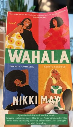 a person holding up a book in front of a computer screen with the title wahala three's company, niki may