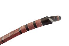 a close up of a pipe with red and black stripes on it's end