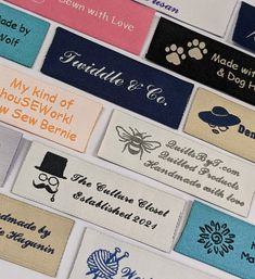 many different types of labels are shown on a table top, including one for knitting and the other for crochet