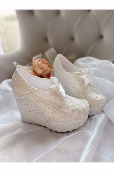 11-12 cm to 4,70 inch   heel length Mother of pearl wedge heel comfortable wedding shoes 100% hand work (You can check our other models in our store from the link below.) https://www.etsy.com/shop/SweetBlueStore Lace Bridal Sneakers, Bridal Shoes, Bridal Casual Shoes, Stylish Bridal Shoes, Wedding Shoes, Platform Shoes, Bride Shoes ,Wedding Shoes Your products will be sent in the shoe box. Your orders will be sent by courier as fast as possible. The shoes are our own production. Production takes Sneaker Wedding, Bride Shoe, Wedding Platform, Lace Bridal Shoes, Shoe Platform, White Bridal Shoes, Wedding Shoes Platform, Bridal Sneakers, Plateau Sneaker